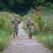 Military police and Civil Affairs Soldiers volunteer at Vilnius animal shelter