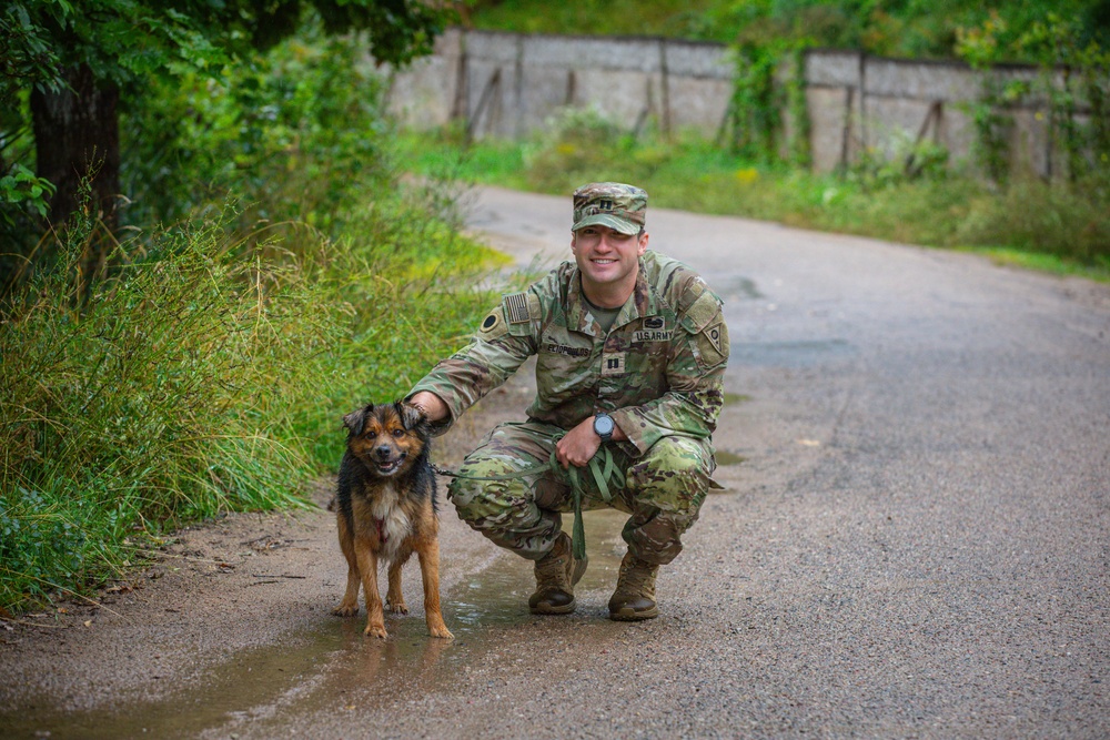 Military police and Civil Affairs Soldiers volunteer at Vilnius animal shelter