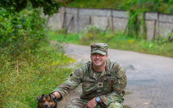Military police and Civil Affairs Soldiers volunteer at Vilnius animal shelter