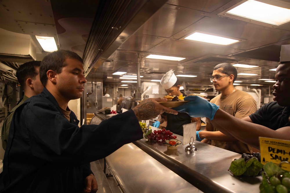 U.S. Sailors, Marines Have Dinner Aboard USS Boxer