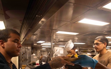 U.S. Sailors, Marines Have Dinner Aboard USS Boxer