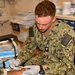 Hospital Corpsman 3rd Class Jack Gray Performs Ingrown Toe Nail Surgery