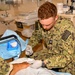 Hospital Corpsman 3rd Class Jack Gray Performs Ingrown Toe Nail Surgery