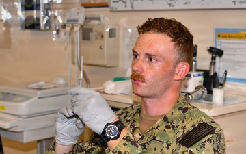 Hospital Corpsman 3rd Class Jack Gray Performs Ingrown Toe Nail Surgery