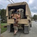 Soldiers deliver supplies in Asheville after Hurricane Helene.