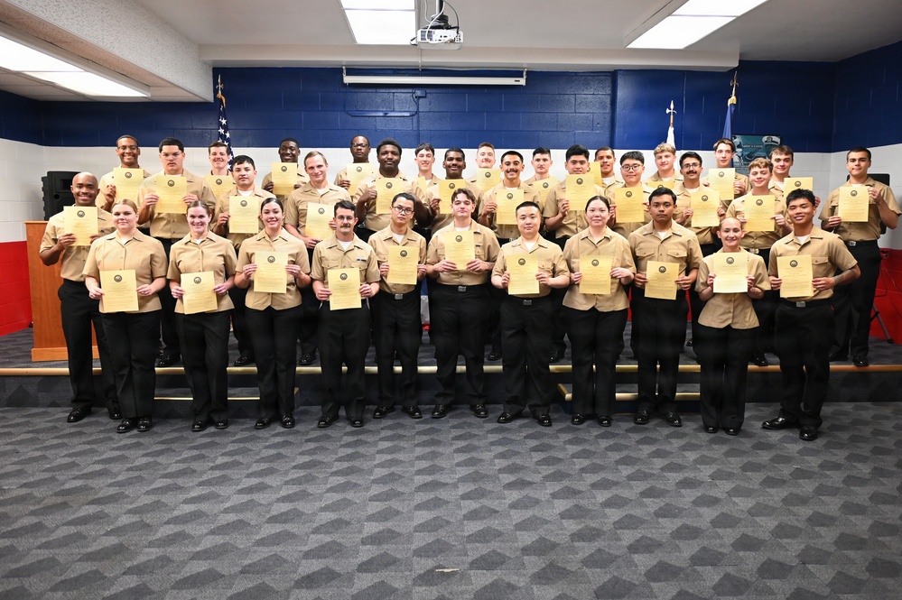 Surface Combat Systems Training Command Great Lakes frocks newly promoted third class petty officers in pinning ceremony.