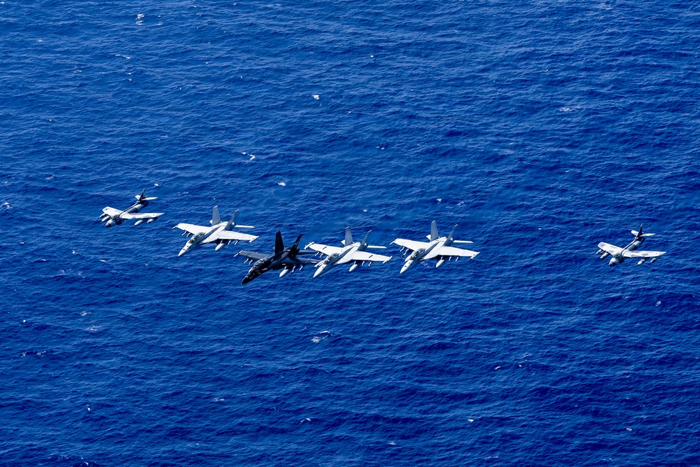 Multinational aircraft fly in formation during Pacific Dragon 2026