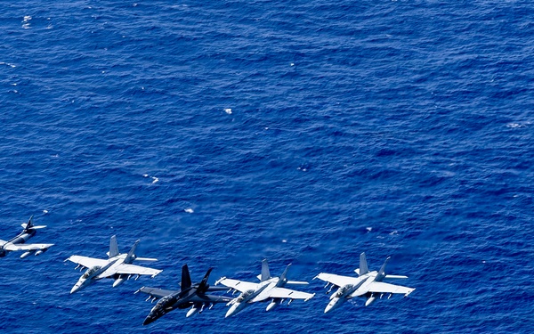 Multinational aircraft fly in formation during Pacific Dragon 2026