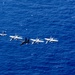 Multinational aircraft fly in formation during Pacific Dragon 2026