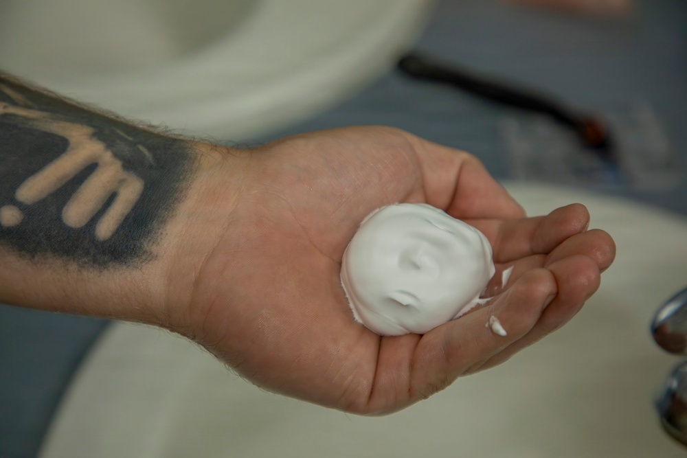 593rd CSC Soldiers Demonstrate Proper Shaving Techniques