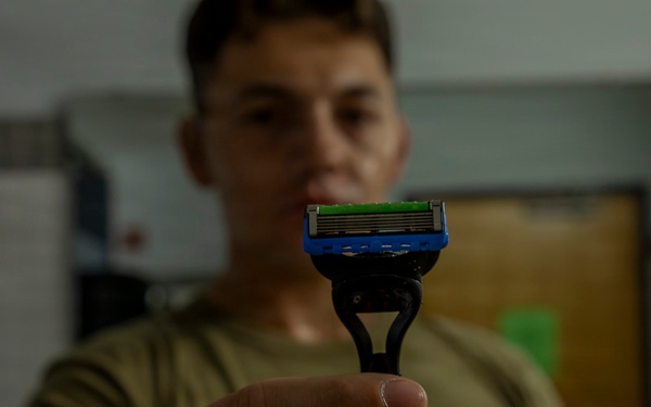 593rd CSC Soldiers Demonstrate Proper Shaving Techniques