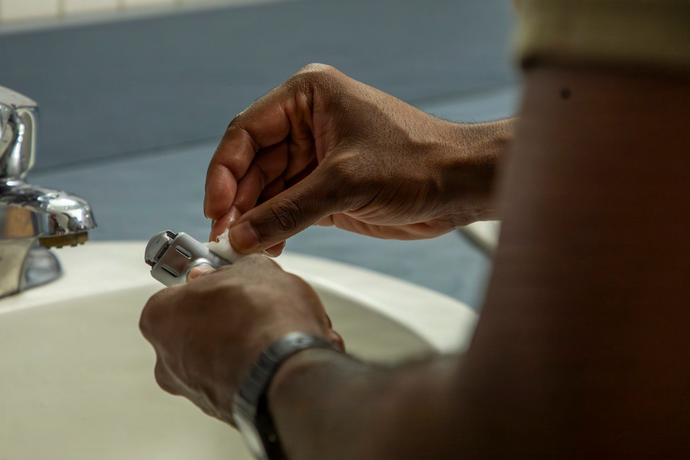 593rd CSC Soldiers Demonstrate Proper Shaving Techniques