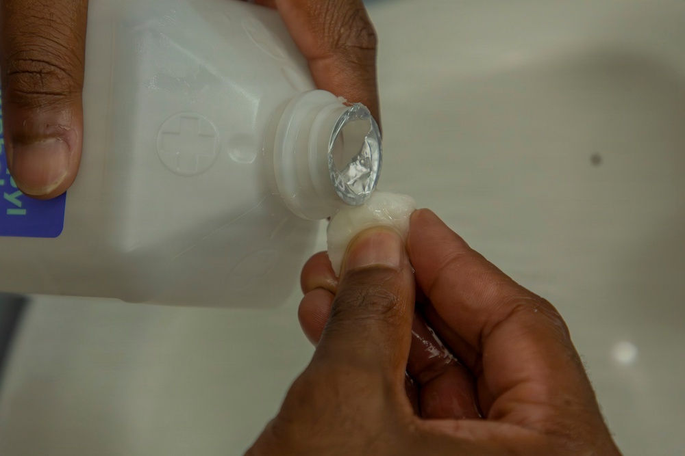 593rd CSC Soldiers Demonstrate Proper Shaving Techniques