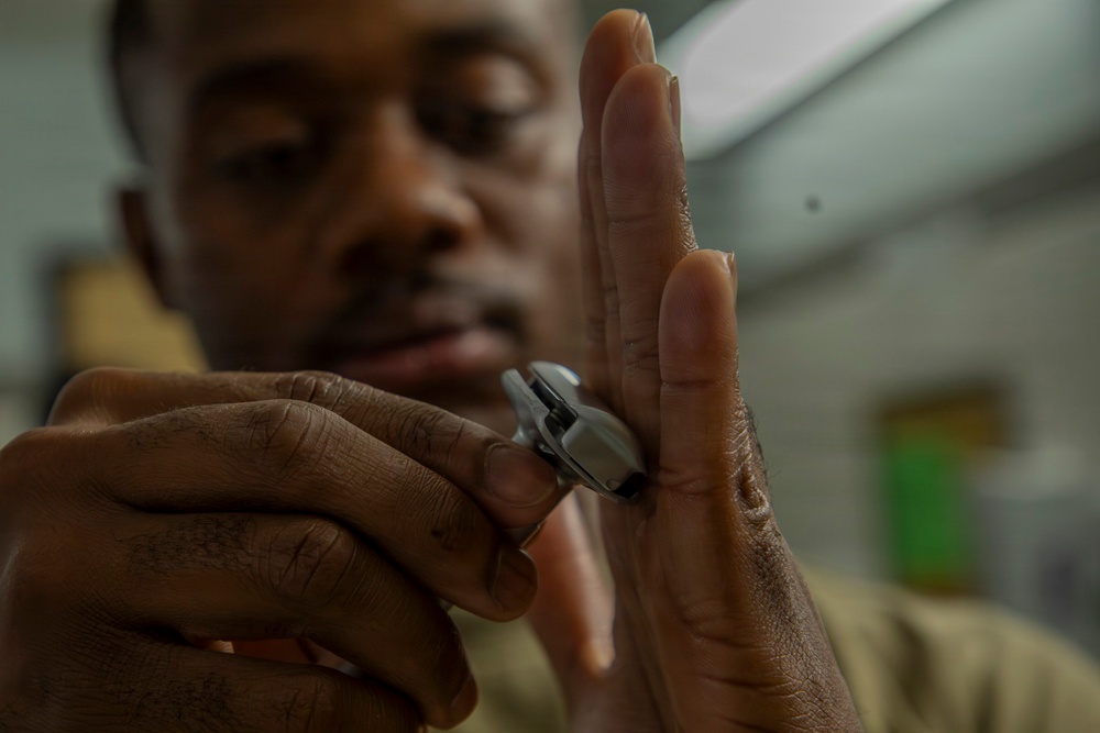 593rd CSC Soldiers Demonstrate Proper Shaving Techniques