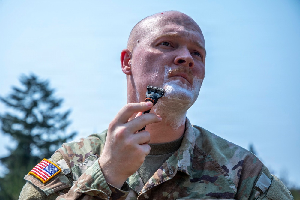 593rd CSC Soldier Demonstrates Effective Field Shaving Techniques