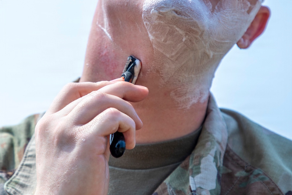 593rd CSC Soldier Demonstrates Effective Field Shaving Techniques