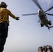 Abraham Lincoln Conducts a Vertical Replenishment with Henry J. Kaiser