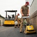 RED HORSE Airman compacts asphalt at Tobyhanna