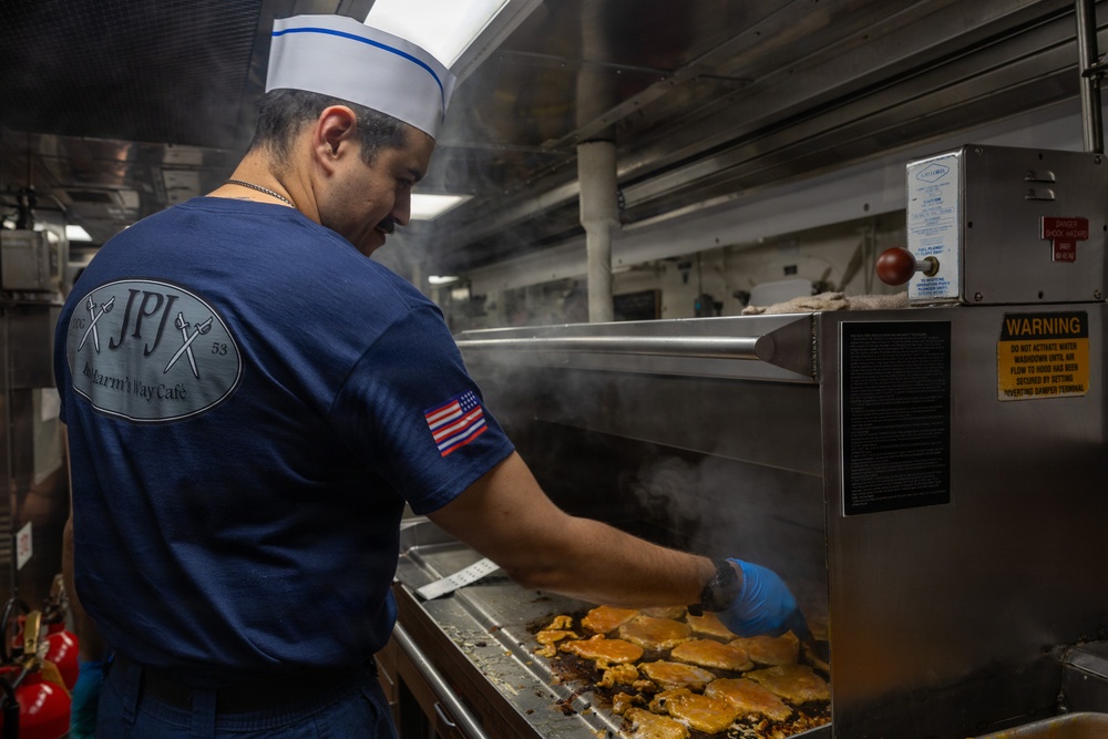 John Paul Jones Sailor Prepares Meal