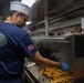 John Paul Jones Sailor Prepares Meal