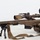 MCAS Marines pose for content 2026 A military or law enforcement operator is in a prone shooting position aiming a large-caliber sniper rifle with a suppressor and bipod. The individual is wearing tactical gear including a ballistic helmet, body armor, and gloves. The setting appears to be an outdoor or rooftop environment with a light-colored surface.