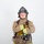 MCAS Marines pose for content 2026 A firefighter in full turnout gear poses with arms crossed against a plain white background. The helmet is black and clearly marked 'ARFF' and 'MCAS MIRAMAR' with the designation 'LEAD FIREFIGHTER'. The image appears to be a professional portrait or official photo.