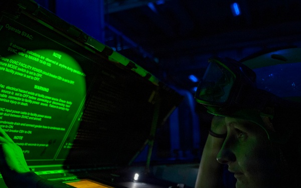 U.S. Marine Airframe Mechanic Performs Aircraft Maintenance
