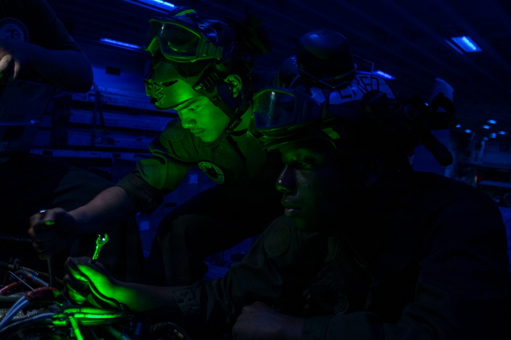 U.S. Marine Flight Line Mechanics Perform Aircraft Maintenance