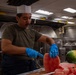 Food Service Specialist Prepares Fruit for the Galley