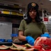 Food Service Specialist Prepares Fruit for the Galley