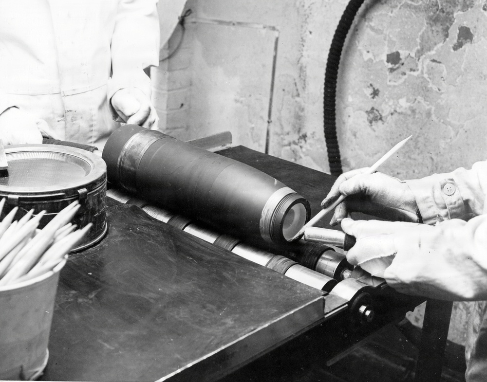 Historical McAlester Army Ammunition Plant photo circa 1940's-employees working on the bomb line