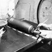 Historical McAlester Army Ammunition Plant photo circa 1940's-employees working on the bomb line