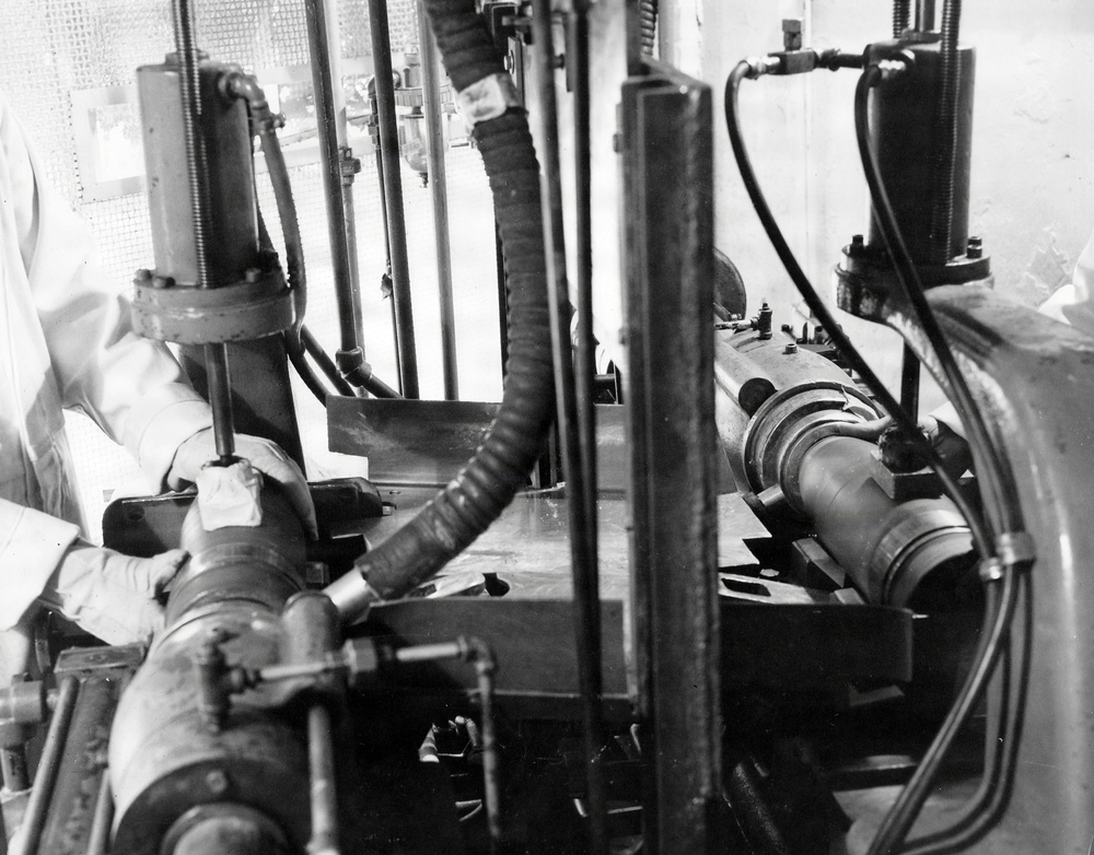 Historical McAlester Army Ammunition Plant photo circa 1940's-employees working on the bomb line
