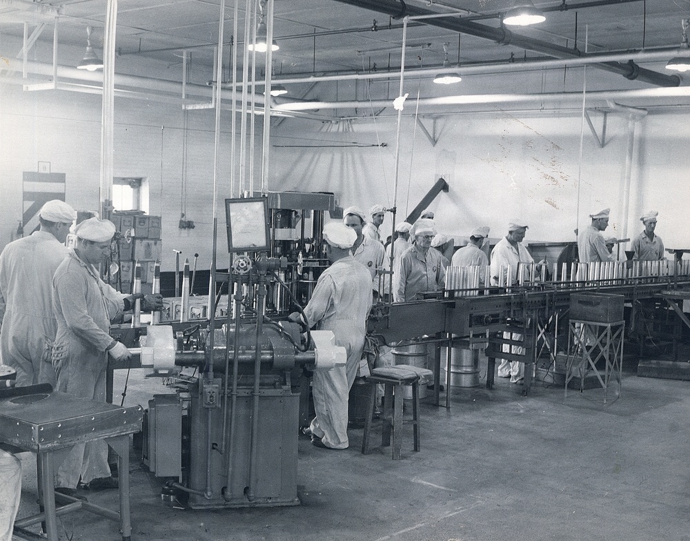 Historical McAlester Army Ammunition Plant photo - circa 1940's- people working on bomb lin