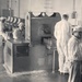 Historical McAlester Army Ammunition Plant photo - circa 1940's- people working on bomb line.