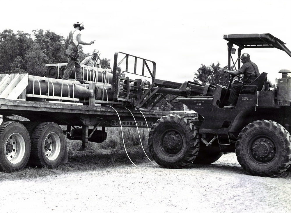 Historical McAlester Army Ammunition Plant photo - bomb truckload docking