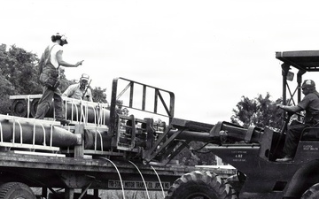Historical McAlester Army Ammunition Plant photo - bomb truckload docking