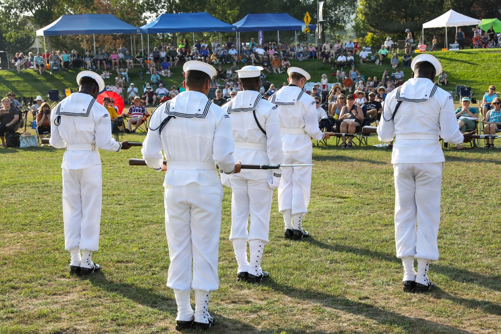 U.S. Navy Ceremonial Guardsmen and Navy Band Northwest perform during Billings Navy Week