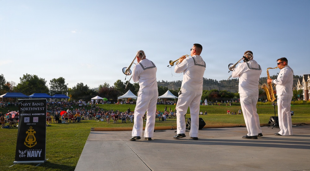 U.S. Navy Ceremonial Guardsmen and Navy Band Northwest perform during Billings Navy Week