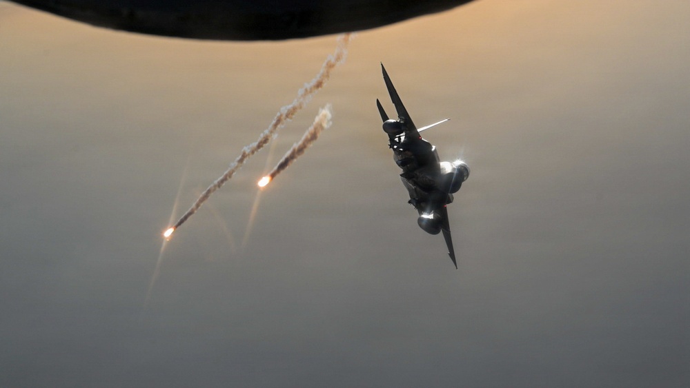 KC-135 refuels F-15s in support of regional security