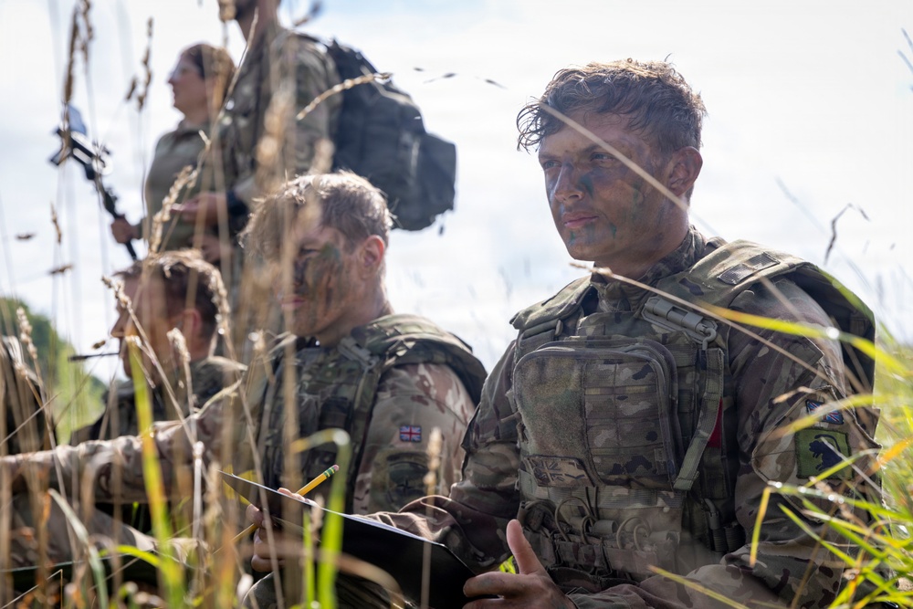 U.S. Army Soldiers with the NATO FLF Battle Group take part in British sniper training in Poland