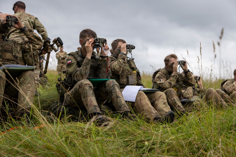 U.S. Army Soldiers with the NATO FLF Battle Group take part in British sniper training in Poland