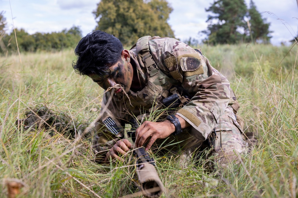 U.S. Army Soldiers with the NATO FLF Battle Group take part in British sniper training in Poland