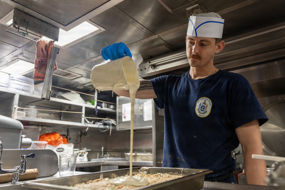 John Paul Jones Sailor Prepares Meal