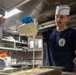 John Paul Jones Sailor Prepares Meal
