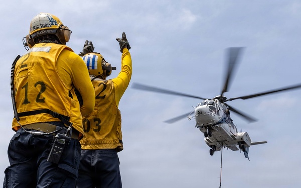 Abraham Lincoln Conducts a Replenishment-at-Sea with Alan Shepard