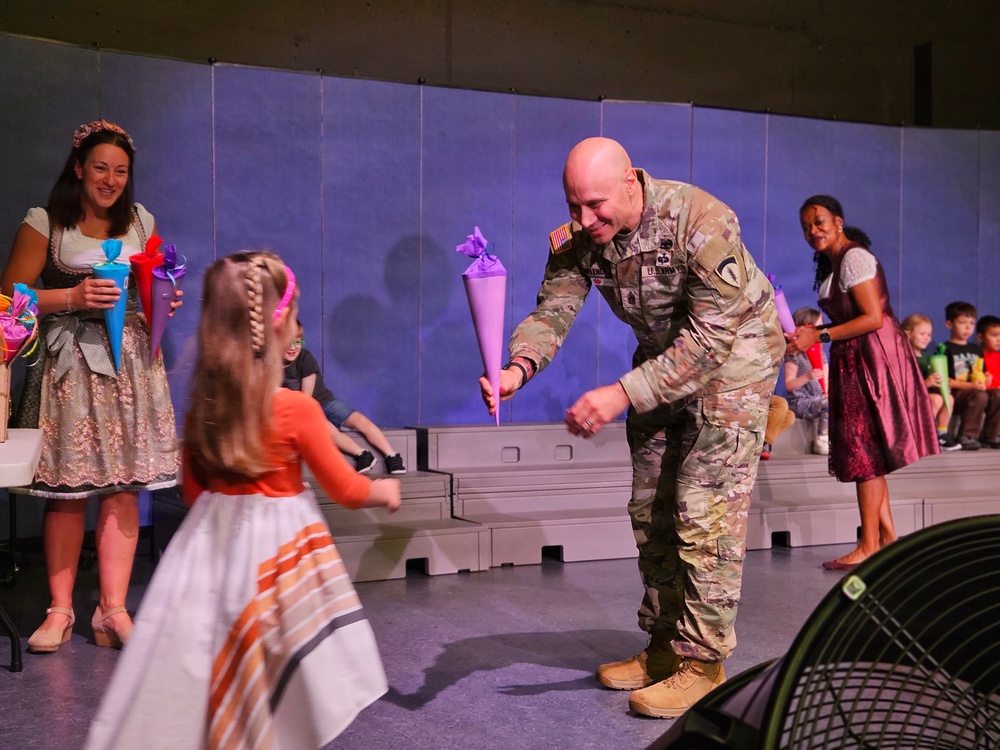 USAG Stuttgart Command Sgt. Maj. Chris Melendez helps Patch Elementary host Einschulung Ceremony
