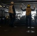 U.S. Navy Boatswain's Mate Signals Landing Craft, Air Cushion 64