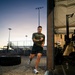 A tattooed male athlete is performing a running or high-knee exercise outdoors near the entrance of an open-air gym facility at dusk or dawn. The setting appears to be a military or athletic compound, with stadium bleachers, flood lights, and a large tractor tire visible in the background. The gym interior contains Concept2 rowing machines, a cable machine, and a punching bag.