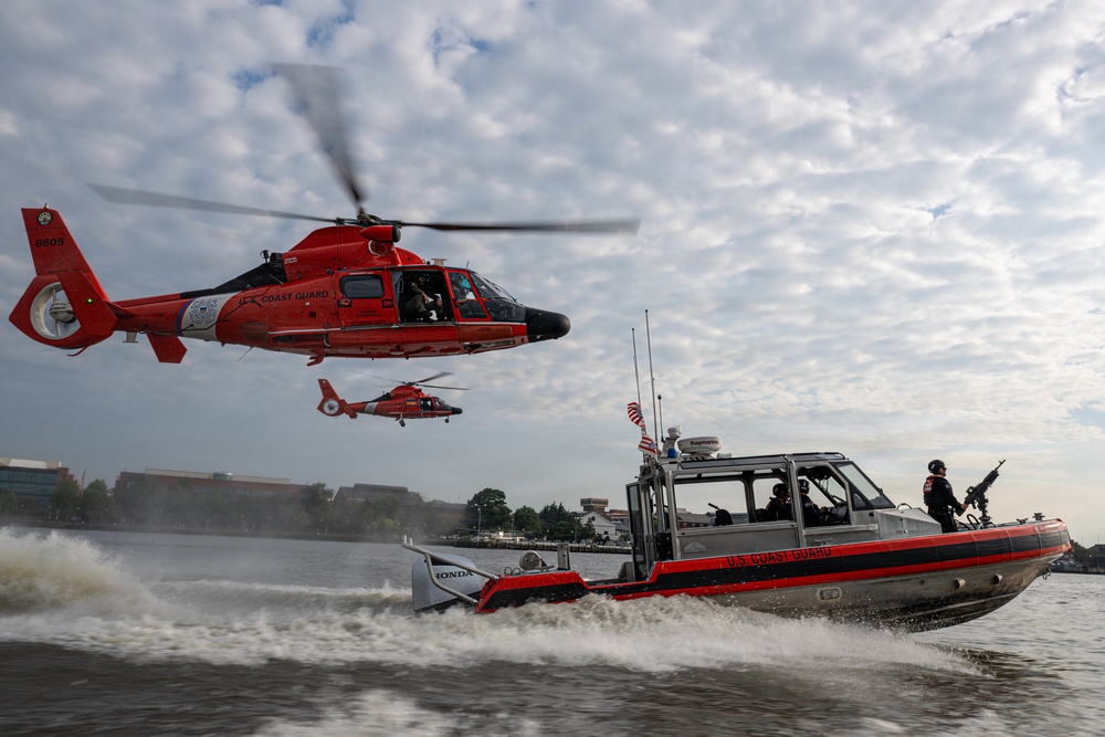 U.S. Coast Guard helicopters and patrol boat conduct joint operations on the Potomac River